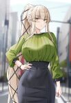  1girl arai_hitomi_(rc_f) artist_name bangs black_skirt blonde_hair blush borrowed_character breasts brown_eyes city closed_mouth commission day green_shirt hair_ribbon hand_on_hip high-waist_skirt highres keenh large_breasts leather leather_skirt long_hair long_sleeves looking_at_viewer medium_skirt mole mole_under_eye original outdoors pencil_skirt ribbon serious shirt skirt solo standing very_long_hair 