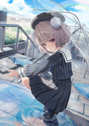  1girl absurdres black_hat black_shirt black_shoes black_skirt blue_ribbon blunt_bangs brown_hair city clouds cloudy_sky commentary hat highres holding holding_umbrella indie_virtual_youtuber kagemoe1003 looking_at_viewer looking_to_the_side mary_janes mountain pleated_skirt pom_pom_(clothes) puddle railing rainbow red_eyes ribbon sailor_collar shigure_ui_(vtuber) shirt shoes skirt sky solo squatting striped_clothes striped_shirt striped_skirt transparent transparent_umbrella ui_(voisona) umbrella voisona 