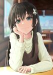  1girl black_hair blurry blurry_background blush casual closed_mouth commentary_request flower green_eyes hair_flower hair_ornament hand_on_own_chin highres indoors k3rd long_hair long_sleeves looking_at_viewer saten_ruiko shirt smile solo table toaru_kagaku_no_railgun toaru_majutsu_no_index white_shirt 