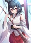  1girl bare_shoulders black_hair blush broom closed_mouth commentary detached_sleeves hair_between_eyes hair_ornament hakama holding holding_broom japanese_clothes kantai_collection nontraditional_miko red_eyes red_hakama ribbon-trimmed_sleeves ribbon_trim short_hair solo wide_sleeves yamashiro_(kancolle) yoshino_(mfmfpng) 