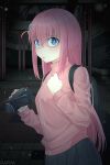  1girl artist_name backpack bag blue_eyes bocchi_the_rock! camera clenched_hand cube_hair_ornament gotou_hitori grey_skirt hair_ornament highres holding holding_camera indoors jacket long_hair one_side_up open_mouth pink_hair pink_jacket pink_track_suit pleated_skirt rappa scared sidelocks skirt solo standing track_jacket 