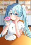  1girl absurdres blue_eyes blue_hair blurry blurry_background chair closed_mouth doughnut food hair_between_eyes hatsune_miku highres holding holding_food indoors jewelry long_hair pendant ryaru_ryaru shirt short_sleeves sitting solo table tongue tongue_out twintails upper_body very_long_hair vocaloid white_shirt 