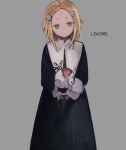  1boy 1girl absurdres black_dress blonde_hair dress hair_ornament highres holding holding_stuffed_toy lenore lenore_lynchfast looking_at_viewer object_hug ragamuffin short_hair skull_hair_ornament stuffed_toy toukashi_(2tou9) 