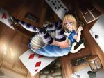  1girl absurdres abukumacl alice_(alice_in_wonderland) alice_in_wonderland blonde_hair blue_eyes blush candle card cosplay dress falling freckles highres kantai_collection looking_up playing_card ribbon scared solo thigh-highs zettai_ryouiki 