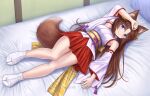  1girl animal_ear_fluff animal_ears arm_up bare_shoulders bed bell blue_eyes blush brown_hair closed_mouth detached_sleeves fox_ears fox_girl fox_tail full_body hair_bell hair_between_eyes hair_ornament highres indoors iroha_(iroha_matsurika) japanese_clothes jingle_bell kimono long_hair long_sleeves looking_at_viewer lying no_shoes nontraditional_miko obi on_back on_bed original parted_bangs pillow pleated_skirt red_skirt ribbon-trimmed_sleeves ribbon_trim sash skirt sleeveless sleeveless_kimono smile socks solo tabi tail twitter_username very_long_hair white_kimono white_sleeves white_socks wide_sleeves 