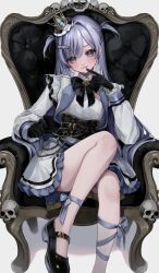  1girl absurdres ankle_bow belt black_belt black_bow black_bowtie black_gloves black_shoes blue_hair bow bowtie chain chair closed_mouth collared_dress crown dress earrings english_commentary frilled_dress frills gloves green_eyes hair_ornament hand_up highres jewelry leg_up light_smile long_hair long_sleeves looking_at_viewer on_chair pointing_at_mouth rereet_t shoes single_hair_intake sitting skull solo text_hair_ornament thighs tongue tongue_out two_side_up vspo! white_background white_dress yano_kuromu 