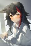 1girl animal_ear_fluff animal_ears black_hair blush commentary_request ears_down hair_between_eyes highres hololive long_sleeves looking_at_viewer multicolored_hair ookami_mio redhead shirai_yu shirt sidelocks solo streaked_hair virtual_youtuber white_shirt wolf_ears wolf_girl yellow_eyes 