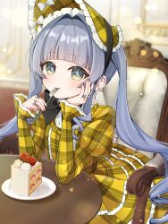  1girl :3 absurdres armchair black_bow black_bowtie blue_hair blurry blurry_background bonnet bow bowtie cake cake_slice chair commentary dress eno_nuo food fork frilled_dress frilled_sleeves frills gold_dress green_eyes hair_intakes highres holding holding_fork juliet_sleeves lolita_fashion long_hair long_sleeves looking_at_viewer official_alternate_costume plaid_clothes plaid_dress plate puffy_sleeves sitting solo symbol-only_commentary table twintails virtual_youtuber vspo! yano_kuromu yano_kuromu_(3rd_costume) 