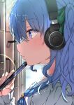  1girl absurdres blue_eyes blue_hair blush closed_mouth from_side hair_between_eyes hair_ribbon headphones highres holding holding_phone hololive hoshimachi_suisei long_hair long_sleeves neckerchief phone ribbon sailor_collar shirt sidelocks sleeves_past_wrists solo virtual_youtuber 