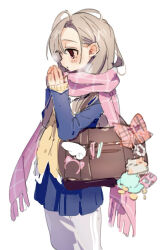  1girl 2000s_(style) bag blue_jacket blue_skirt blush bow breathing_on_hands brown_hair cardigan charm_(object) commentary_request cowboy_shot faux_retro_artstyle grey_pants hands_up highres jacket kmnk_(kumanuko) layered_sleeves long_hair long_sleeves original pants pants_under_skirt pink_scarf plaid_bow pleated_skirt red_bow red_eyes scarf school_bag simple_background skirt solo track_pants white_background yellow_cardigan 