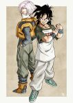  2boys back-to-back baggy_pants black_eyes black_hair blue_eyes boots commentary_request dragon_ball dragon_ball_z furrowed_brow grin hands_in_pockets highres kakeru_(dbskakeru) male_focus multiple_boys pants pink_hair shirt shoes smile sneakers son_goten t-shirt trunks_(dragon_ball) vest wristband yellow_vest 