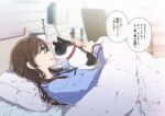  1girl bedroom blue_shirt blurry blurry_background brown_hair cat commentary_request long_hair long_sleeves muromaki original pajamas parted_lips shirt smile solo speech_bubble translation_request under_covers 
