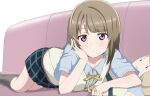  1girl asymmetrical_hair blunt_bangs blush bob_cut closed_mouth collarbone commentary couch hand_on_own_cheek hand_on_own_face head_rest light_brown_hair looking_at_viewer love_live! love_live!_nijigasaki_high_school_idol_club lying nakasu_kasumi nijigasaki_academy_school_uniform on_couch on_side school_uniform short_hair stuffed_toy tottsan vest violet_eyes yellow_vest 