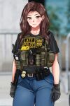  1girl badge belt black_gloves black_hair blue_pants blurry blurry_background blush body_cam brown_belt brown_eyes brown_hair closed_mouth collarbone commentary english_commentary gloves gun handgun highres holster jizi load_bearing_vest original outdoors pants pocket police police_badge police_uniform policewoman shirt short_sleeves smile solo standing stun_gun t-shirt uniform united_states utility_belt walkie-talkie weapon 