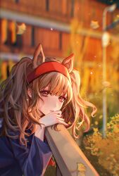  1girl angelina_(arknights) animal_ears arknights blue_shirt blurry blurry_background brown_eyes building bush cangli chromatic_aberration earrings eyelashes falling_leaves fox_ears fox_girl hairband hand_rest heart heart_earrings highres jewelry lamppost leaf light_particles long_sleeves medium_hair outdoors parted_lips pink_nails railing red_hairband shirt solo stud_earrings tree two_side_up 
