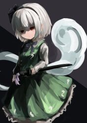  1girl black_bow black_bowtie black_hairband bow bowtie closed_mouth collared_shirt commentary frilled_skirt frills garakuraku green_skirt green_vest grey_hair hairband highres hitodama hitodama_print holding holding_sword holding_weapon katana konpaku_youmu konpaku_youmu_(ghost) long_sleeves red_eyes shaded_face sheath sheathed shirt skirt skirt_set solo sword touhou vest weapon white_shirt 