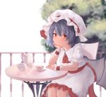  1girl absurdres cup day dress feet_out_of_frame grey_hair highres looking_at_viewer outdoors overexposure r_utchi red_eyes remilia_scarlet sitting smile solo table teacup teapot touhou white_dress 