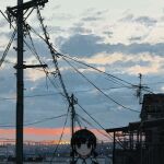  1girl absurdres antennae black_eyes black_hair building city clouds collared_shirt highres house looking_at_viewer morning original outdoors power_lines scenery shirt short_hair short_twintails sky solo sunrise twintails uniunimikan upper_body utility_pole white_shirt 