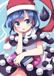  1girl black_capelet blob blue_eyes blue_hair blush book capelet doremy_sweet dream_soul dress hat highres holding holding_book multicolored_clothes multicolored_dress nightcap open_mouth pom_pom_(clothes) red_headwear ruu_(tksymkw) short_hair solo tail tapir_tail touhou 