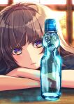  1girl backlighting blunt_bangs blush bottle brown_hair closed_mouth eyelashes highres indoors long_hair looking_at_viewer multicolored_eyes orange_eyes original ramune solo upper_body violet_eyes window yuu_knmy 