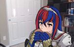  1girl alear_(female)_(fire_emblem) alear_(fire_emblem) blue_eyes blue_gloves blue_hair burger chriiis commentary door eating english_commentary fire_emblem fire_emblem_engage food gloves hair_between_eyes hairband heterochromia highres holding holding_food indoors jerma985 long_hair multicolored_hair photo_background real_life red_eyes redhead shirt solo streaked_hair two-tone_hair upper_body white_shirt 