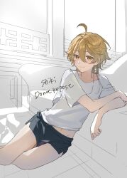  1boy aether_(genshin_impact) ahoge alternate_costume alternate_hairstyle artist_name black_shorts blonde_hair blush clenched_hand closed_mouth commentary_request couch earrings feet_out_of_frame genshin_impact hair_between_eyes highres indoors jewelry leaning_to_the_side long_hair looking_at_viewer male_focus navel on_floor shadow shirt short_shorts short_sleeves shorts single_earring sitting smile solo t-shirt unfinished white_shirt yellow_eyes zashikino_shiki 