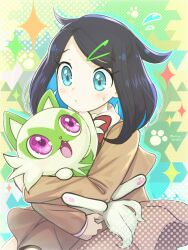  1girl black_hair blue_eyes blush bow bowtie brown_coat coat colored_inner_hair commentary_request green_background hair_ornament hairclip holding holding_pokemon liko_(pokemon) multicolored_hair pokemon pokemon_(anime) pokemon_(creature) pokemon_horizons red_bow red_bowtie runachikku sprigatito 