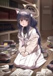  1girl absurdres animal_ear_fluff animal_ears bags_under_eyes black_hair black_undershirt blue_archive blue_eyes blue_hairband book book_stack bookshelf cardigan cat_ears di_le_to glasses grey_cardigan grey_neckerchief hairband halo highres inkwell long_skirt low_twintails neckerchief open_book paper pleated_skirt quill sailor_collar school_uniform seiza serafuku sitting skirt solo twintails ui_(blue_archive) white_sailor_collar white_serafuku white_skirt 