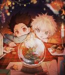  2boys black_hair blue_eyes candle christmas christmas_ornaments cookie food gon_freecss hair_between_eyes highres hunter_x_hunter kiko killua_zoldyck long_sleeves male_focus multiple_boys snow_globe sparkle spiky_hair star_(symbol) table upper_body white_hair 