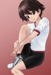  1girl ankle_socks bike_shorts black_shorts black_socks brown_eyes brown_hair closed_mouth commentary_request girls_und_panzer gym_shirt gym_uniform highres hugging_own_legs isobe_noriko knee_up looking_at_viewer red_background shirt shoes short_hair short_shorts short_sleeves shorts simple_background sitting smile sneakers socks solo t-shirt white_footwear white_shirt yoyokkun 