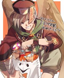  1boy absurdres candy commentary_request fire_emblem fire_emblem:_path_of_radiance fire_emblem_heroes food grey_eyes grin halloween_costume highres holding holding_candy holding_food janaff_(fire_emblem) long_sleeves looking_at_viewer male_focus official_alternate_costume orange_background outside_border scar scar_on_face short_hair simple_background smile solo souen_senri translation_request wings 