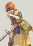  1boy bag bandana belt belt_buckle blue_shirt boots brown_belt brown_eyes brown_footwear brown_hair bruise buckle coat commentary dragon_quest dragon_quest_viii grey_background hand_up hero_(dq8) high_collar highres holding holding_sword holding_weapon injury knee_boots looking_to_the_side macho_ojiji male_focus open_mouth pants red_bandana red_headwear shirt shoulder_bag shoulder_belt sleeveless_coat solo sword torn_clothes twitter_username weapon yellow_coat 