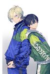  2boys absurdres blonde_hair blue_eyes blue_hair blue_jacket blue_lock blue_pants closed_mouth cowboy_shot gradient_hair green_jacket green_pants hand_tattoo highres isagi_yoichi jacket long_hair long_sleeves looking_at_viewer male_focus michael_kaiser multicolored_hair multiple_boys pants short_hair smile sohu standing tattoo two-tone_hair white_background 