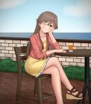  1girl alternate_costume arashio_(kancolle) blue_sky brown_eyes brown_hair chair clouds commentary crossed_legs day dress feet_out_of_frame highres horizon jacket kantai_collection konato_k long_hair ocean one_eye_closed outdoors pink_jacket railing sandals sky smile solo table yellow_dress 