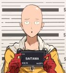  1boy :o bald barbie_mugshot_(meme) bodysuit cape character_name gloves grey_cape highres holding holding_sign looking_at_viewer male_focus meme one-punch_man rakeemspoon red_gloves saitama_(one-punch_man) sign solo upper_body yellow_bodysuit 