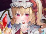  1girl blonde_hair commentary_request cropped crystal flandre_scarlet food fruit hat highres holding holding_food looking_at_viewer medium_hair mob_cap one_side_up red_eyes solo strawberry touhou unfinished upper_body usushio white_headwear wings 