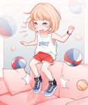  1girl ball basketball_(object) blonde_hair blue_eyes blush child collarbone commentary commission couch dolphin_shorts english_commentary female_child full_body highres indoors monchichiwa open_mouth original red_shorts shoes short_hair shorts sneakers solo tank_top tennis_ball variant_set watch watch white_tank_top 
