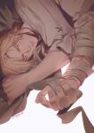  1boy bandaged_arm bandages blonde_hair brown_shirt closed_mouth dion_lesage earrings final_fantasy final_fantasy_xvi highres jewelry looking_at_viewer lying magehikari male_focus on_side orange_eyes shirt short_hair solo twitter_username upper_body upside-down white_background 