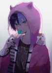  1boy animal_hood animal_on_shoulder awakening_beat_(project_sekai) beat_eater_(vocaloid) blue_hair candy commentary_request dark_blue_hair food gradient_background grey_eyes hair_between_eyes hamster hand_up highres holding holding_candy holding_food holding_lollipop hood hood_up hooded_jacket jacket jewelry jishio lollipop long_sleeves looking_at_viewer male_focus mole mole_under_eye multicolored_hair necklace official_alternate_costume project_sekai ring short_hair solo split-color_hair two-tone_hair upper_body 