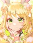  1girl animal_ears blonde_hair bow butterfly_hair_ornament celine_(fire_emblem) closed_mouth eyelashes finger_bow fire_emblem fire_emblem_engage flower green_bow green_eyes hair_flower hair_ornament hand_on_own_face highres long_hair looking_at_viewer rabbit_ears smile solo twitter_username upper_body youhei_choregi 