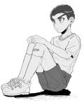  1boy alternate_costume bandaid bandaid_on_knee bandaid_on_leg danganronpa:_trigger_happy_havoc danganronpa_(series) from_side frown greyscale highres ishimaru_kiyotaka knees_up male_focus monochrome muro_(nrvc5252) shirt shoes short_hair short_sleeves shorts simple_background sitting solo white_background 