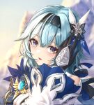  1girl adjusting_hair agenoumi black_gloves black_hairband blue_cape blue_hair blurry blurry_background blush cape clothing_cutout commentary_request double-parted_bangs eula_(genshin_impact) genshin_impact gloves hair_between_eyes hair_ornament hairband hand_up highres looking_at_viewer medium_hair mountain multicolored_eyes open_mouth parted_lips portrait shoulder_cutout sidelocks solo sunset two-tone_gloves upper_body violet_eyes vision_(genshin_impact) white_sleeves wide_sleeves 