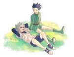  2boys black_hair blue_eyes closed_eyes dated gon_freecss green_footwear green_jacket green_shorts highres hunter_x_hunter jacket killua_zoldyck layered_sleeves long_sleeves looking_at_another lying male_child male_focus multiple_boys on_back on_grass shirt short_hair short_over_long_sleeves short_sleeves shorts simple_background sitting smile spiky_hair white_background white_hair white_shirt yanxy114 
