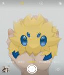  animal_focus blue_eyes commentary_request english_text extra_eyes fake_phone_screenshot fake_screenshot grey_background holding holding_pokemon joltik looking_at_viewer mawari_yado_inori_ootori_maru pokemon pokemon_(creature) pov simple_background solo_focus straight-on viewfinder 