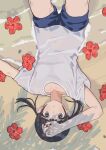  1girl black_hair blue_shorts brown_eyes canty! collarbone flower hand_on_own_head hibiscus highres looking_at_viewer lying on_back original outdoors shadow shirt shorts solo twintails upper_body upside-down 