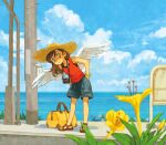  1girl bag blue_shorts blue_sky bracelet brown_eyes brown_hair camera camera_around_neck closed_mouth clouds day duffel_bag feathered_wings flower hat jewelry medium_hair monaka_(siromona) orange_shirt original outdoors sandals shirt shorts sky smile solo straw_hat tank_top wings 