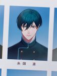  1boy aqua_hair blue_lock buttons character_name closed_mouth commentary green_hair hair_between_eyes highres itoshi_rin kyul_gnsn looking_at_viewer male_focus school_uniform short_hair solo 