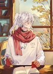  1boy bishounen blue_eyes book chuan04826 earrings fulgur_ovid gloves highres indoors jewelry long_hair looking_to_the_side male_focus nijisanji nijisanji_en pen ponytail red_gloves red_scarf scarf sitting smile solo sweater white_hair window 