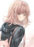  1girl backpack bag black_jacket blush danganronpa_(series) danganronpa_2:_goodbye_despair flipped_hair from_behind grey_background highres hood hooded_jacket iwano_(iwanohiroko) jacket looking_at_viewer looking_back medium_hair nanami_chiaki pink_eyes rorikon_shinshi simple_background smile solo watermark 