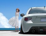  1girl akiran_(r32) arms_behind_back blue_sky brown_eyes brown_hair car clouds day dress full_body highres motor_vehicle ocean original outdoors short_hair sky solo standing toyota toyota_86 water white_dress 